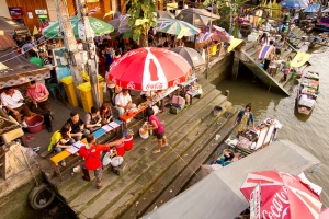 Vendors selling local foods in Amphawa floating market