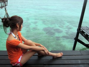 Staring at crystal clear water