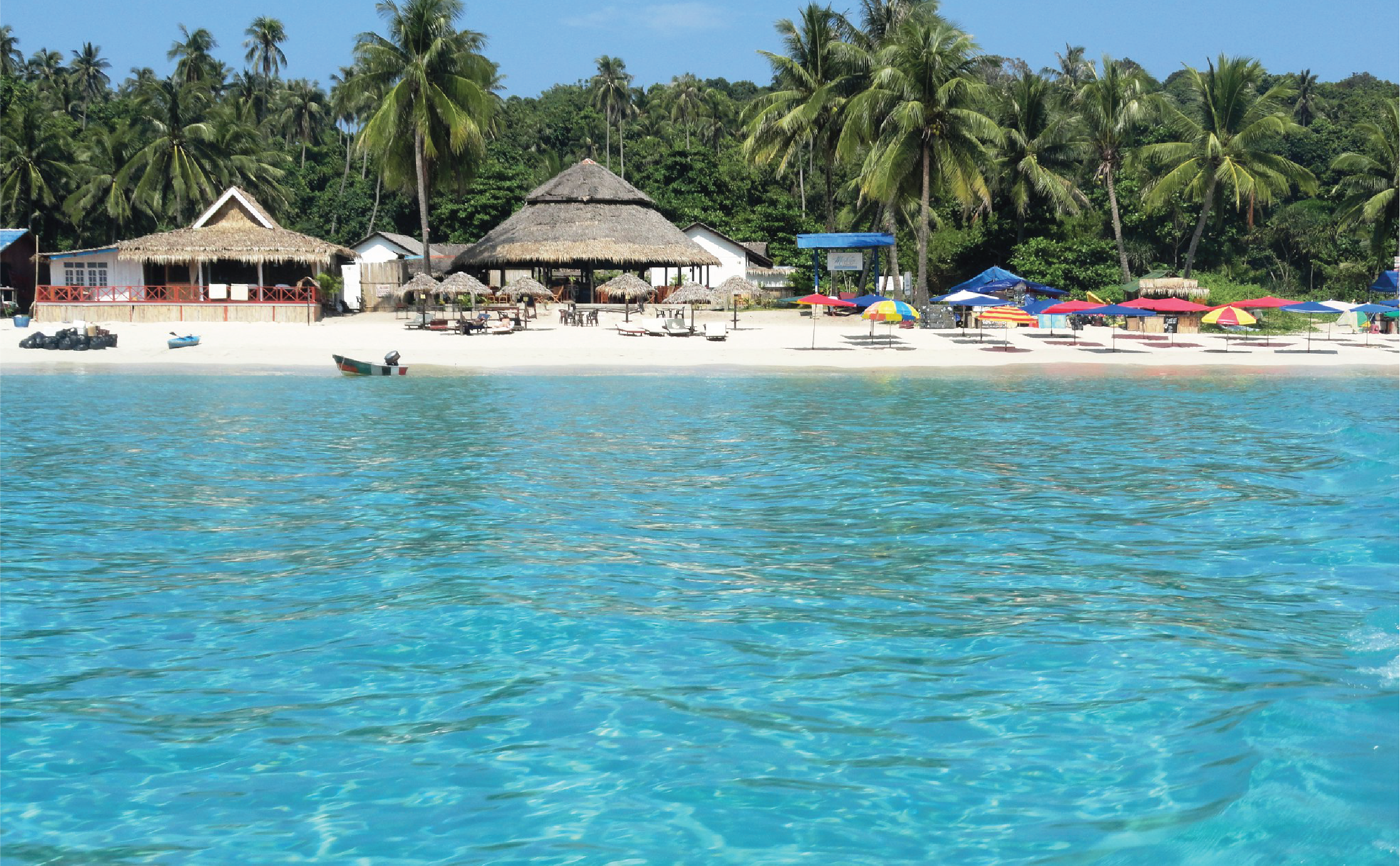 long beach has many chalets and huts at perhentian island