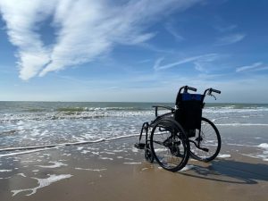 wheelchair by the beach