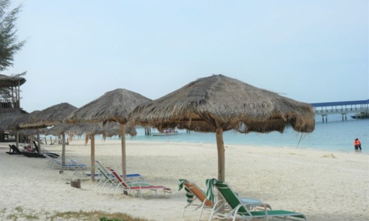 Pulau besar beach with huts 