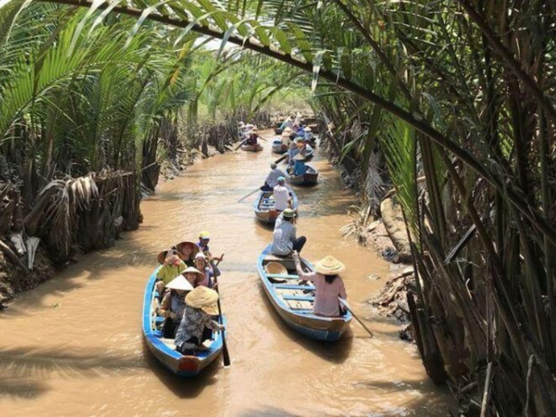 Hand-rowed Sampan through Thoi Son canal