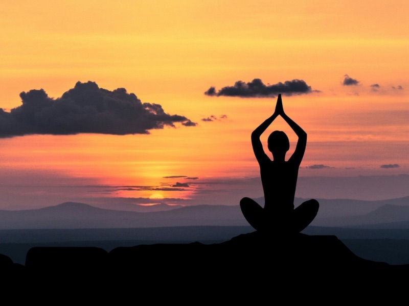 Beachfront sunrise yoga