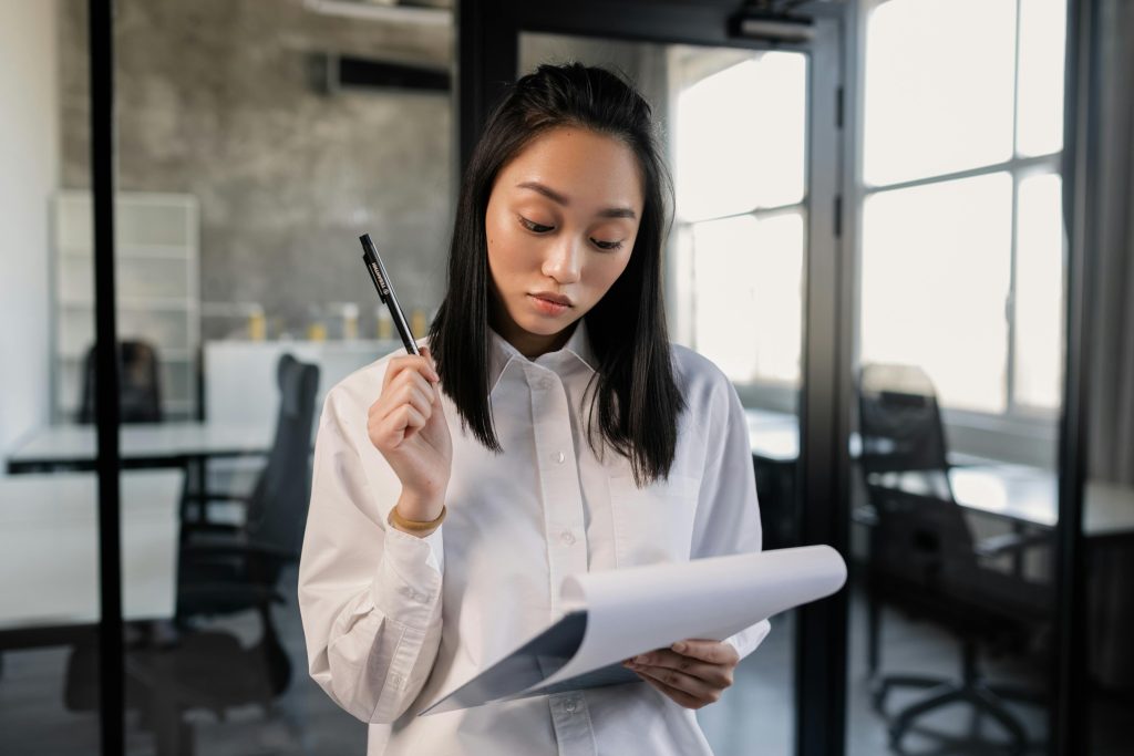 Woman holding clipboard