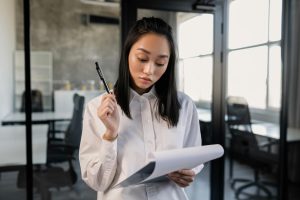 Woman holding clipboard