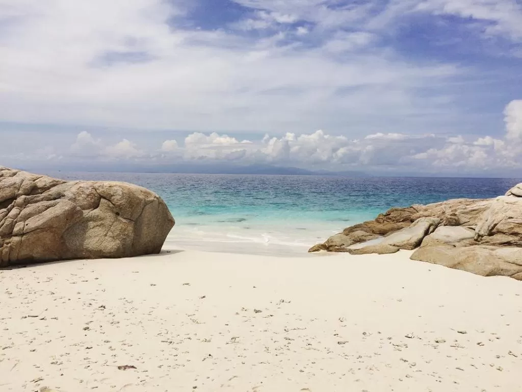 rock formation on sandy beach pulau lang tengah