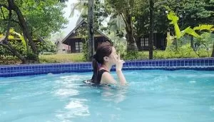pulau besar aseania island resort swimming pool girl